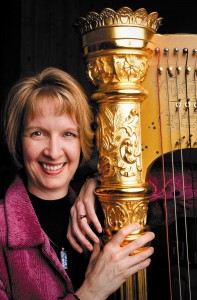 Photo of Tami Briggs with Harp